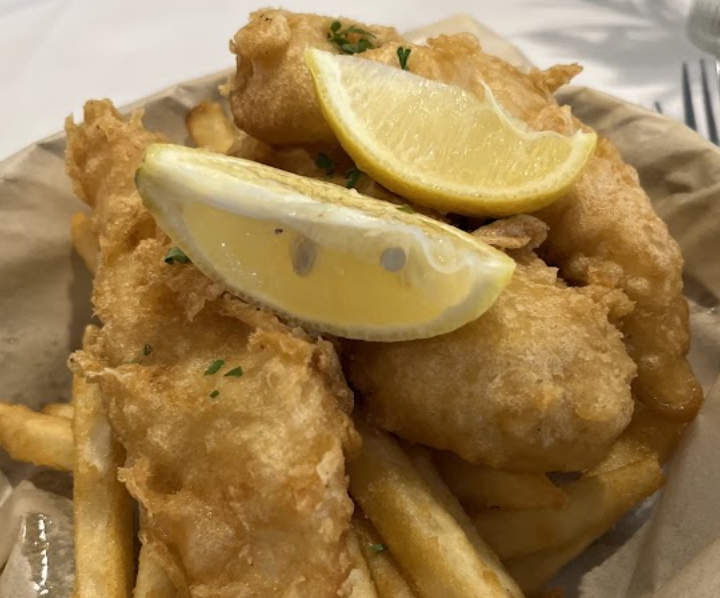 Duval's Fresh. Local. Seafood. signature dishes Fish and ChipsPan Roasted SalmonBread Pudding